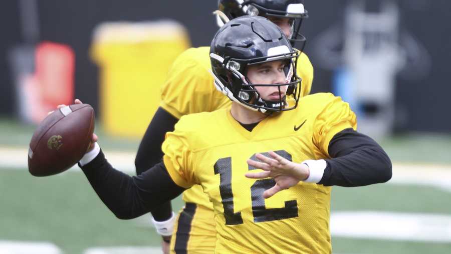 IOWA CITY, IOWA- APRIL 22:  Quaterback Cade McNamara #12 of the Iowa Hawkeyes  throws a pass during the Iowa Spring Open Practice at Kinnick Stadium on April 22, 2023 in Iowa City, Iowa.  (Photo by Matthew Holst/Getty Images)